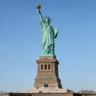 The Statue of Liberty on her island pedestal, with correct t