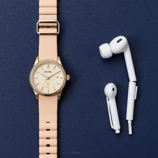 A product flat-lay on a #1A1A2E (deep dark blue) background,
