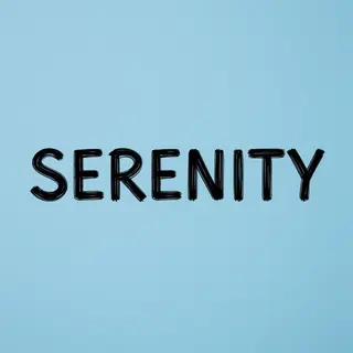 The word 'SERENITY' written large and centered on a solid li