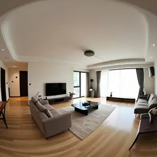 A wide-angle shot of a modern living room interior showing e