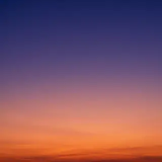 A sunset sky gradient on a flat surface from #FF6B35 (orange