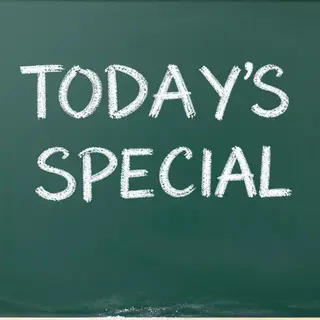 The phrase 'TODAY'S SPECIAL' written in white chalk on a dar