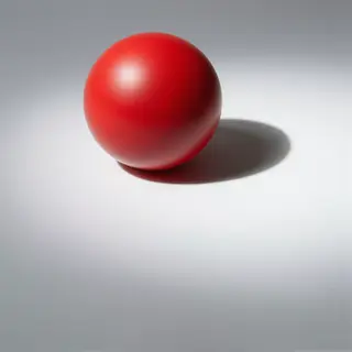 A red sphere on a white surface with a single shadow cast to