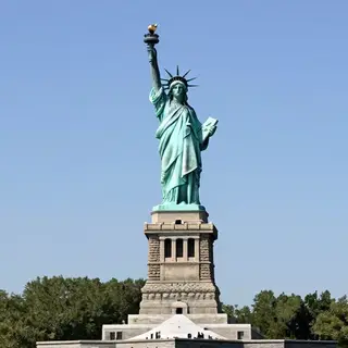 The Statue of Liberty on her island pedestal, with correct t