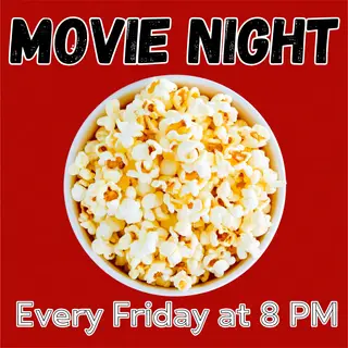 A movie night poster with a large popcorn image in the cente