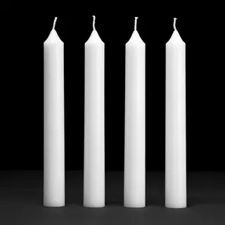 Exactly 4 white candles standing on a dark surface