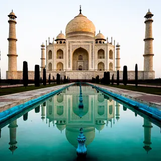 The Taj Mahal in Agra seen from the reflecting pool, with ac