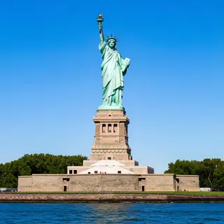 The Statue of Liberty on her island pedestal, with correct t