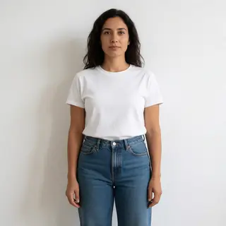A woman standing upright in a relaxed pose, arms at her side