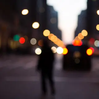 A street photograph with shallow depth of field as if shot a