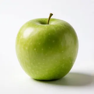 A ripe green apple on a seamless white background with soft 