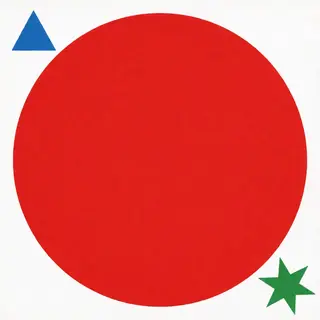 A large red circle, a small blue triangle, and a medium gree