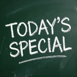 The phrase 'TODAY'S SPECIAL' written in white chalk on a dar