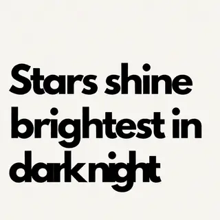 'Stars shine brightest in the dark night' displayed on a cle