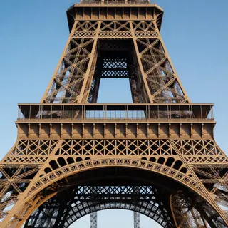 The Eiffel Tower in Paris on a clear day, architecturally ac