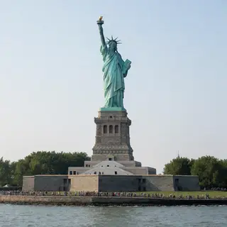 The Statue of Liberty on her island pedestal, with correct t