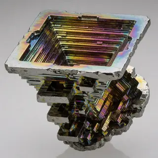 A specimen of bismuth crystal showing accurate iridescent ox