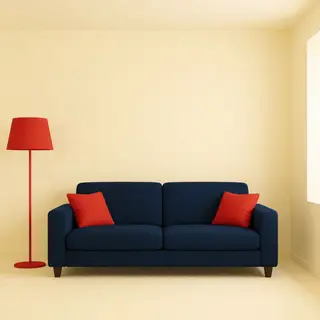 A minimalist room with walls in #F5E6CC (warm cream), a sofa