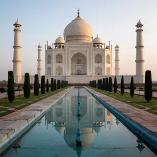 The Taj Mahal in Agra seen from the reflecting pool, with ac