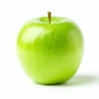 A ripe green apple on a seamless white background with soft 
