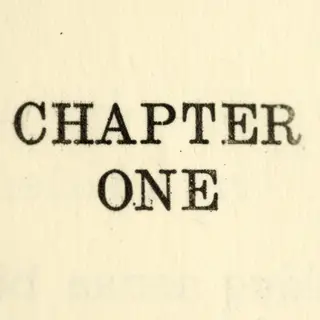 The word 'CHAPTER ONE' typed on aged paper with a vintage ty
