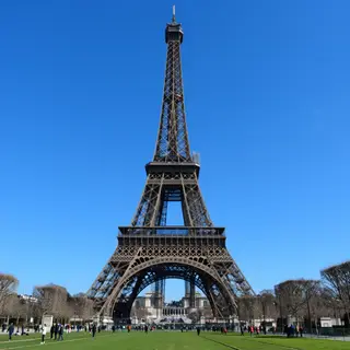 The Eiffel Tower in Paris on a clear day, architecturally ac