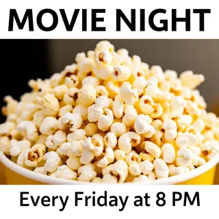 A movie night poster with a large popcorn image in the cente