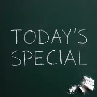 The phrase 'TODAY'S SPECIAL' written in white chalk on a dar