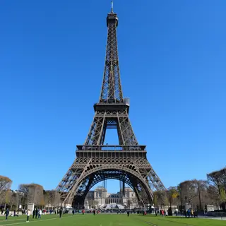 The Eiffel Tower in Paris on a clear day, architecturally ac