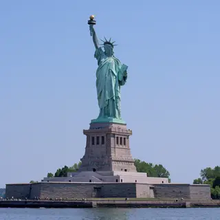 The Statue of Liberty on her island pedestal, with correct t
