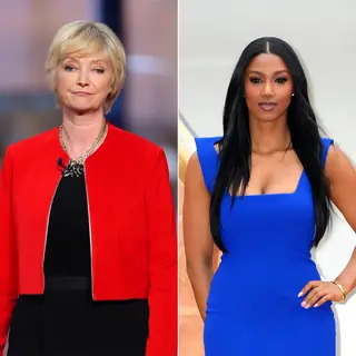 Two women standing side by side: one with short blonde hair 