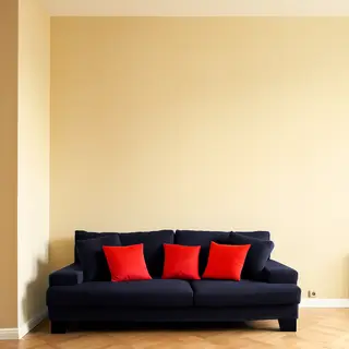 A minimalist room with walls in #F5E6CC (warm cream), a sofa