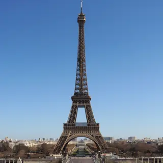 The Eiffel Tower in Paris on a clear day, architecturally ac