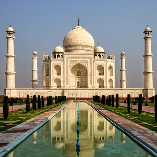 The Taj Mahal in Agra seen from the reflecting pool, with ac