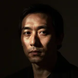A portrait lit with classic Rembrandt lighting — triangle of