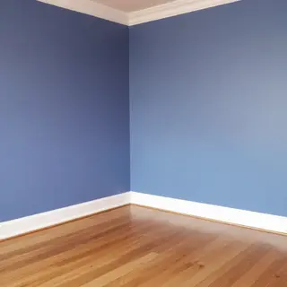 A room with walls in #4A90D9 (medium blue) with warm wooden 