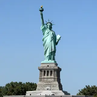 The Statue of Liberty on her island pedestal, with correct t