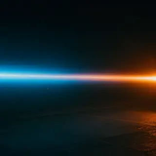 A cinematic frame with blue and orange anamorphic lens flare