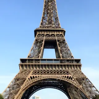 The Eiffel Tower in Paris on a clear day, architecturally ac