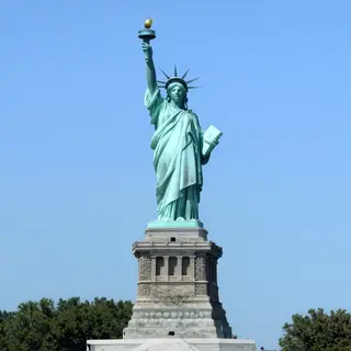 The Statue of Liberty on her island pedestal, with correct t
