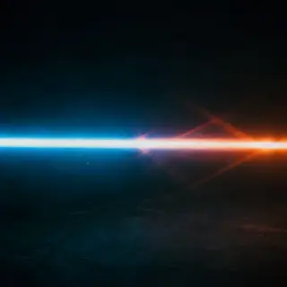 A cinematic frame with blue and orange anamorphic lens flare