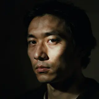 A portrait lit with classic Rembrandt lighting — triangle of