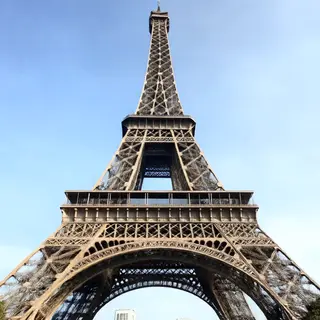 The Eiffel Tower in Paris on a clear day, architecturally ac
