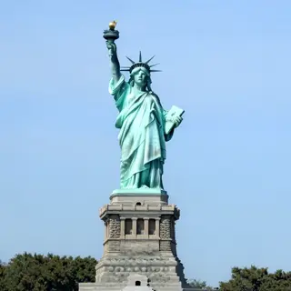 The Statue of Liberty on her island pedestal, with correct t