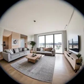 A wide-angle shot of a modern living room interior showing e