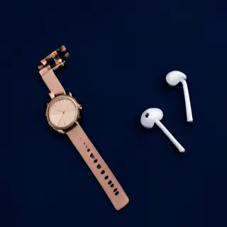 A product flat-lay on a #1A1A2E (deep dark blue) background,