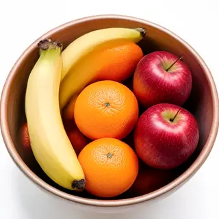 A fruit bowl containing exactly 3 bananas, 4 oranges, and 2 
