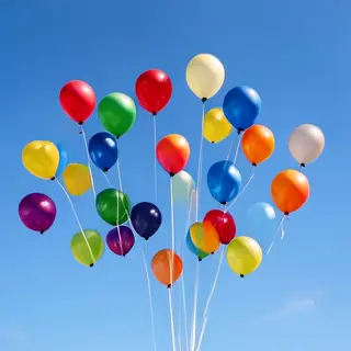 Exactly 11 colorful balloons floating against a clear blue s