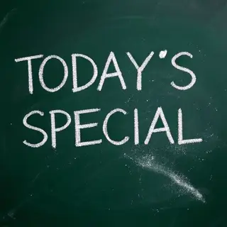 The phrase 'TODAY'S SPECIAL' written in white chalk on a dar