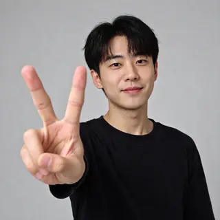 A person making a peace sign with their right hand, clearly 
